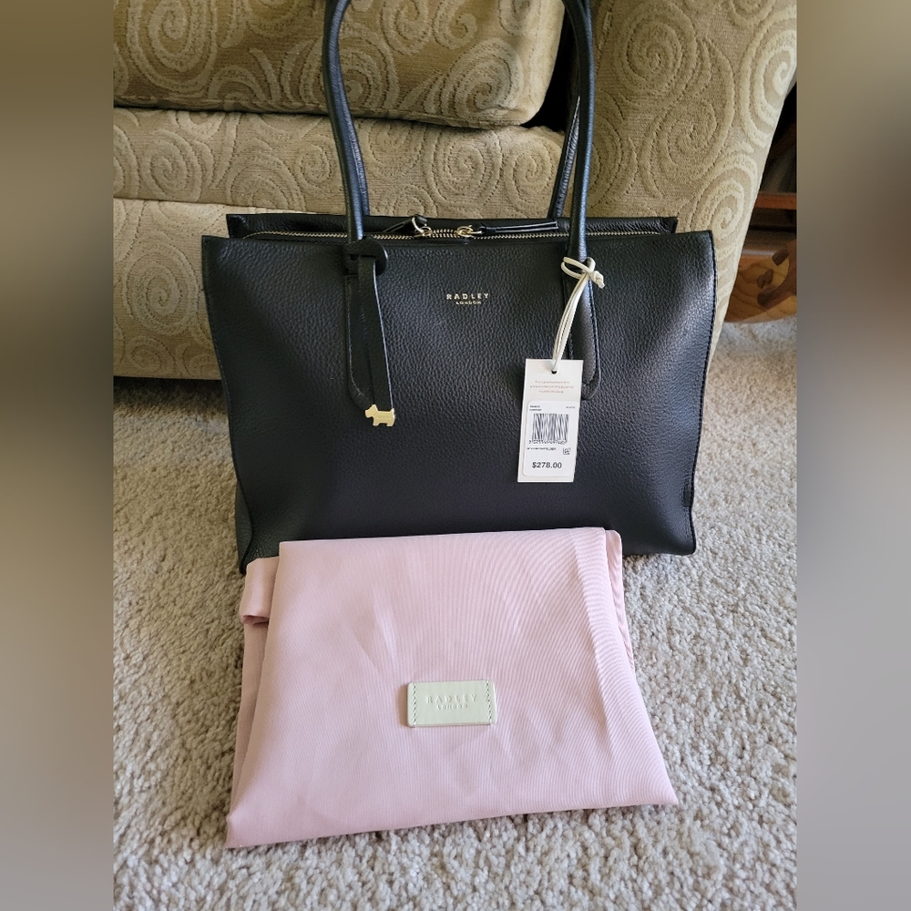 Randley of London handbag. Black never used. Tags on it. Medium size.